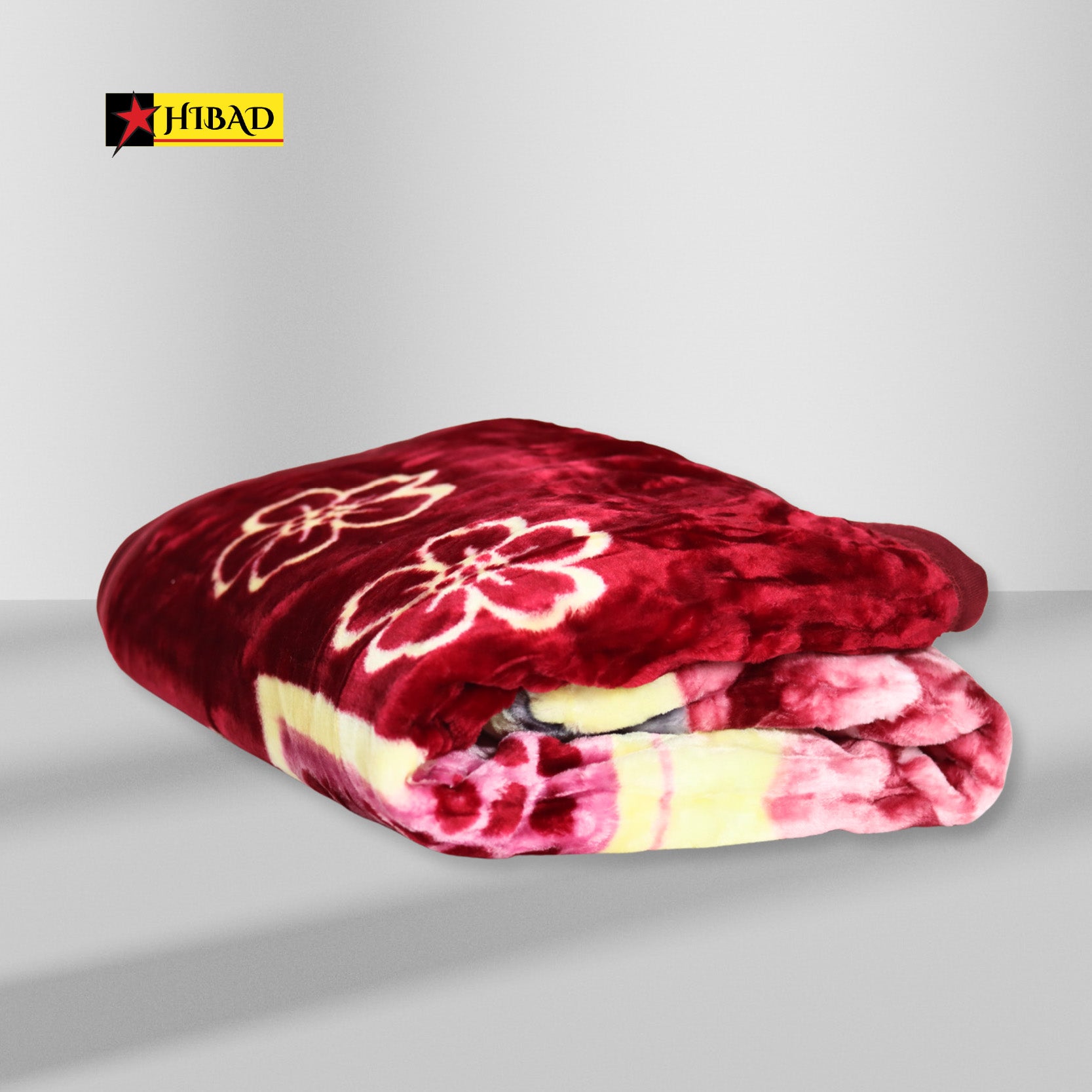 Folded Hibad Blanket with Elegant Burgundy and Pink Floral Pattern