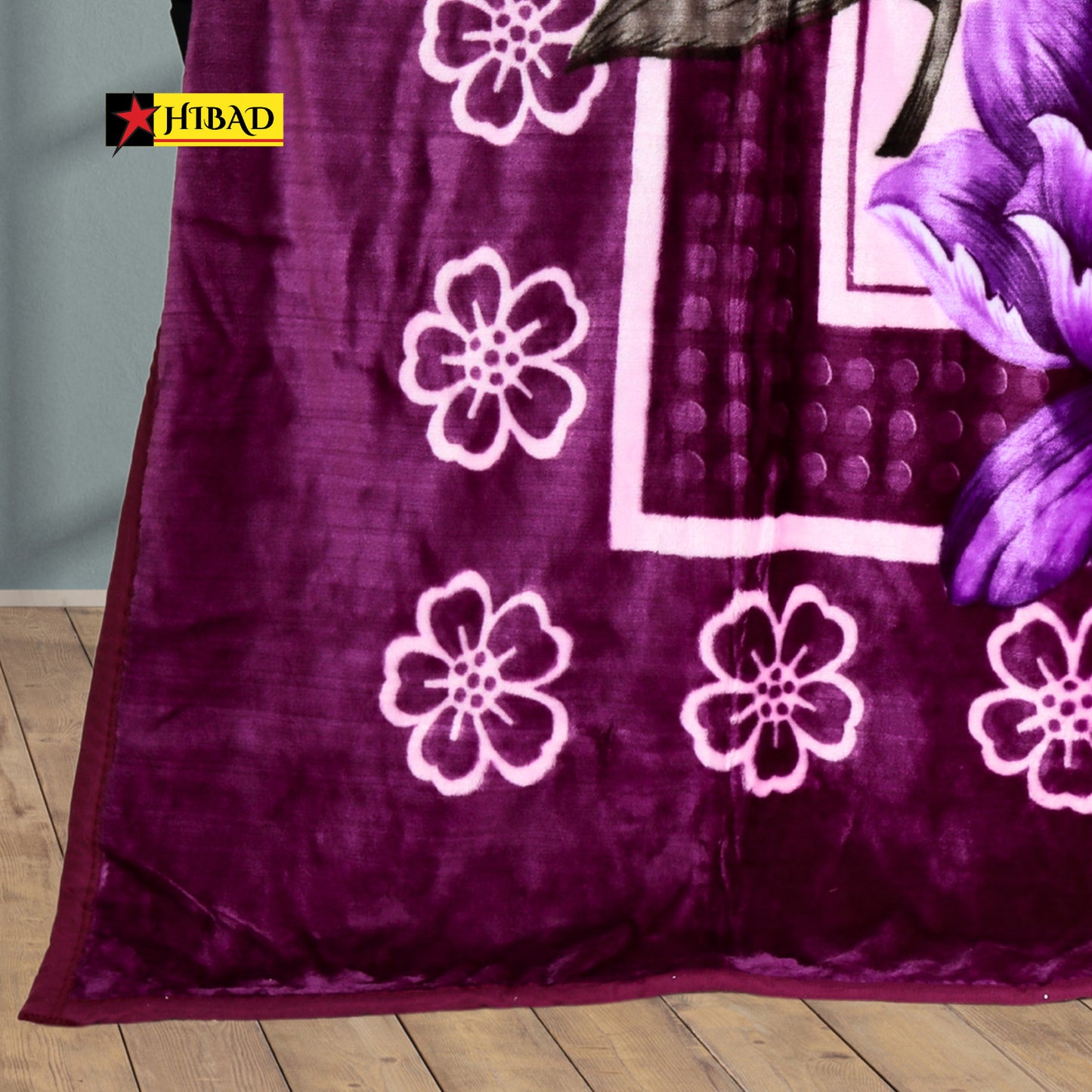 Hibad Single Blanket in shades of purple and pink, adorned with floral and abstract patterns. Made from soft Raschel fabric for a luxurious and durable experience.