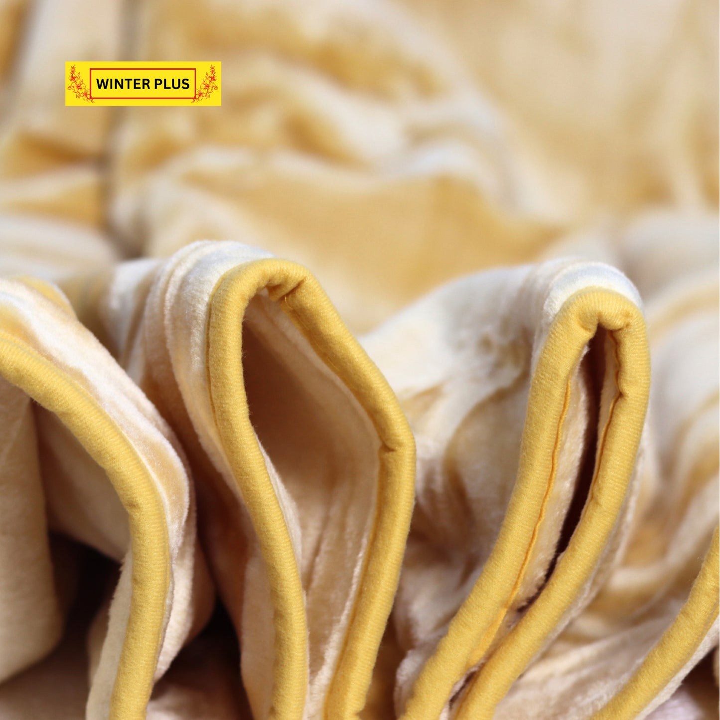 Close-Up of Soft Winter Plus Blanket Fabric – Camel Yellow with edge details